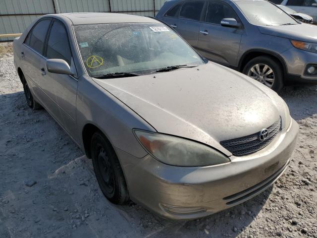TOYOTA CAMRY LE 2002 with VIN JTDBE32K720084590 - Photo from auction