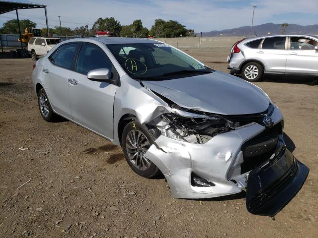TOYOTA COROLLA L 2017 with VIN 5YFBURHEXHP593580 - Photo from auction