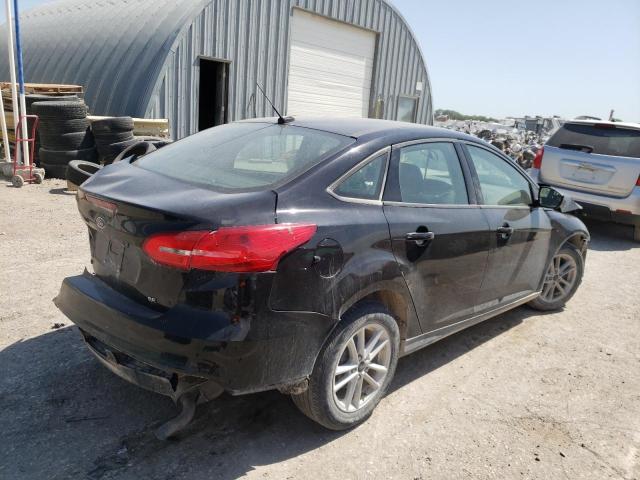 Photo 4 from auction – 2018 FORD FOCUS SE with VIN 1FADP3F29JL206205