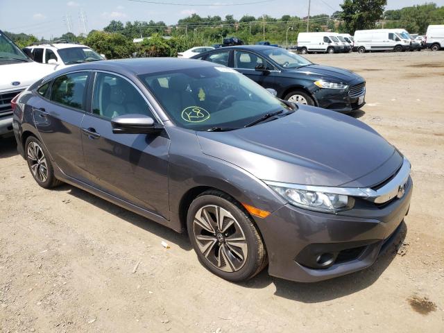 HONDA CIVIC EX 2016 with VIN 19XFC1F4XGE220572 - Photo from auction