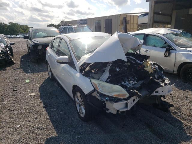 FORD FOCUS SE 2013 with VIN 1FADP3K25DL205403 - Photo from auction