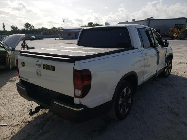 Photo 4 from auction – 2018 HONDA RIDGELINE with VIN 5FPYK2F62JB002928