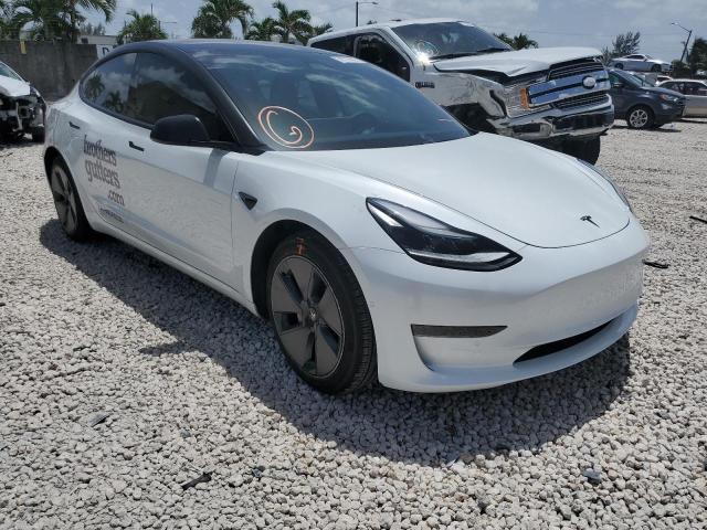 TESLA MODEL 3 2021 with VIN 5YJ3E1EA7MF991615 - Photo from auction
