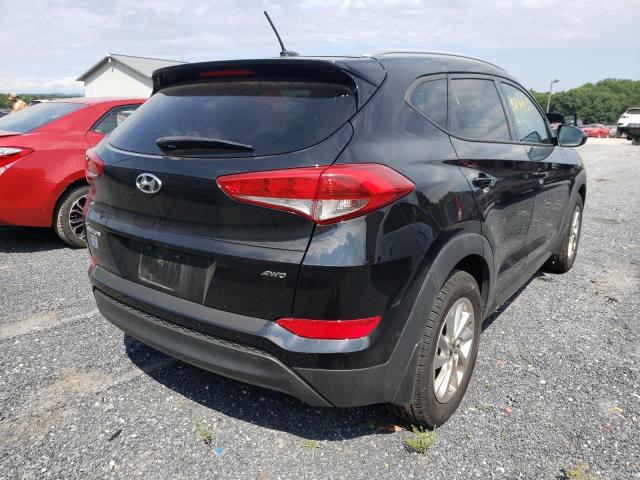 Photo 4 from auction – 2016 HYUNDAI TUCSON LIM with VIN KM8J3CA49GU021569