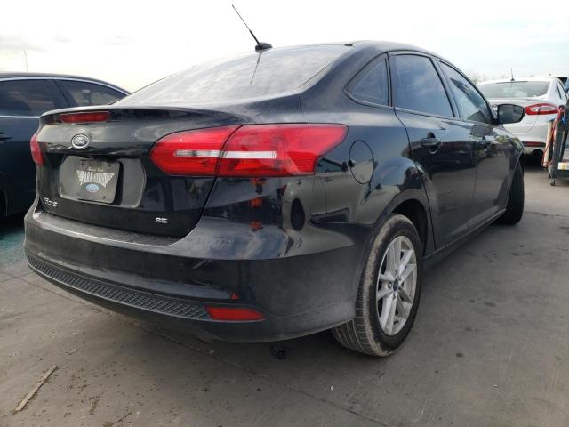 Photo 4 from auction – 2018 FORD FOCUS SE with VIN 1FADP3F20JL277339