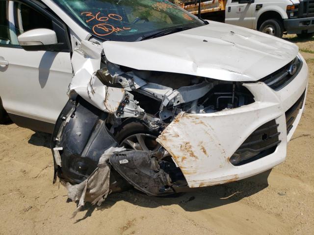 Photo 9 from auction – 2016 FORD ESCAPE TIT with VIN 1FMCU9J98GUC49258