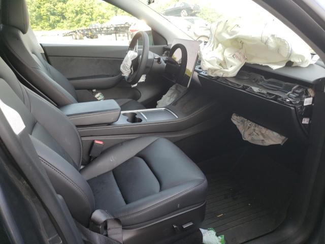 Photo 5 from auction – 2022 TESLA MODEL Y with VIN 7SAYGAEE6NF325014