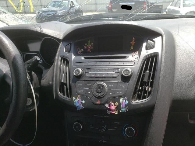 Foto 9 de la subasta – 2015 FORD FOCUS SE con VIN 1FADP3K21FL288895