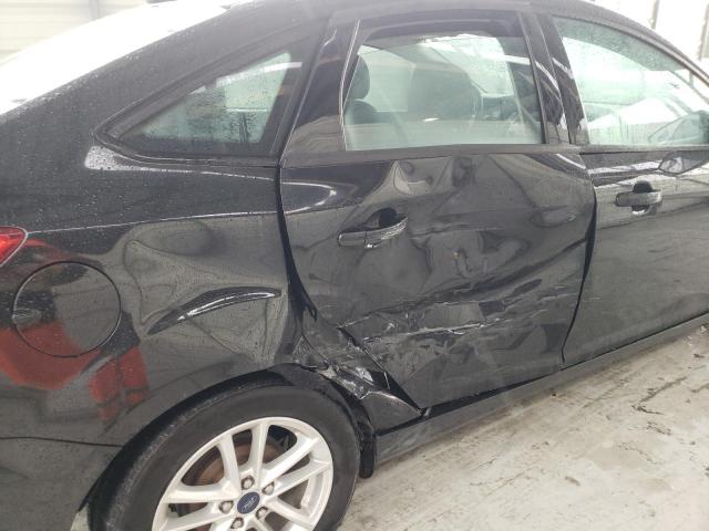 Photo 9 from auction – 2015 FORD FOCUS SE with VIN 1FADP3F28FL383139