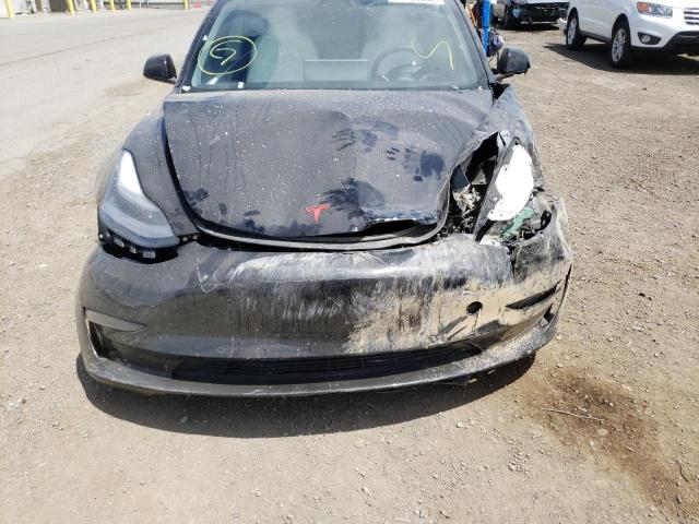 Photo 9 from auction – 2021 TESLA MODEL 3 with VIN 5YJ3E1EA5MF053368