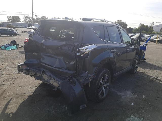 Photo 4 from auction – 2016 TOYOTA RAV4 XLE with VIN JTMWFREV0GD088407