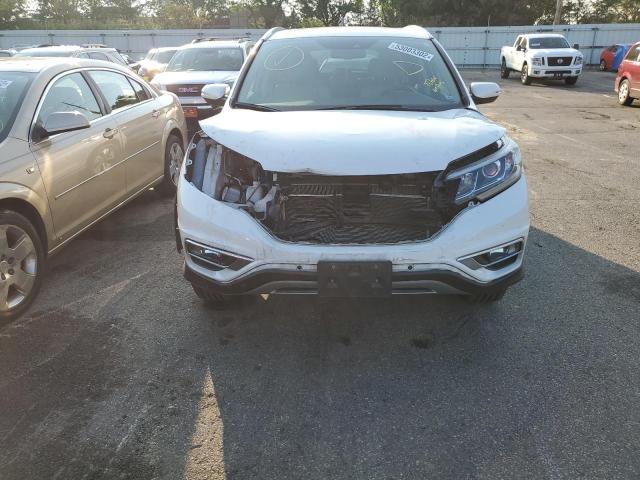 Photo 9 from auction – 2015 HONDA CR-V TOURI with VIN 5J6RM4H94FL080197