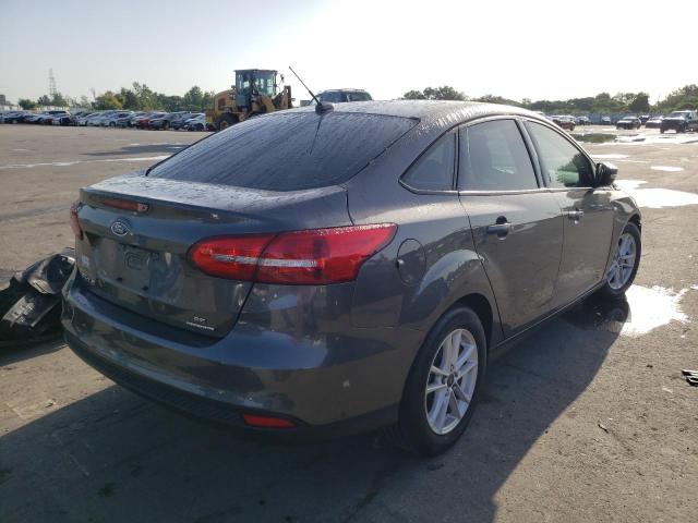 Photo 4 from auction – 2016 FORD FOCUS SE with VIN 1FADP3F23GL250032