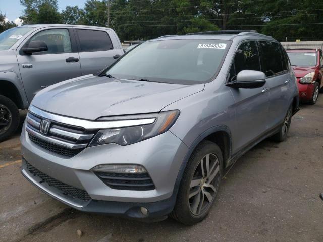 Photo 2 from auction – 2017 HONDA PILOT TOUR with VIN 5FNYF6H92HB035501
