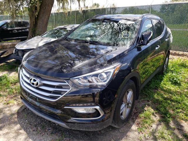 Photo 2 from auction – 2018 HYUNDAI SANTA FE S with VIN 5NMZU3LB3JH101271