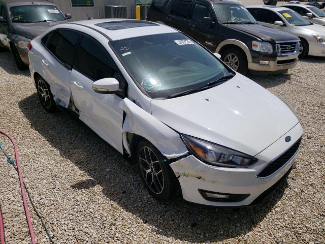 FORD FOCUS SEL 2017 with VIN 1FADP3H24HL208581 - Photo from auction