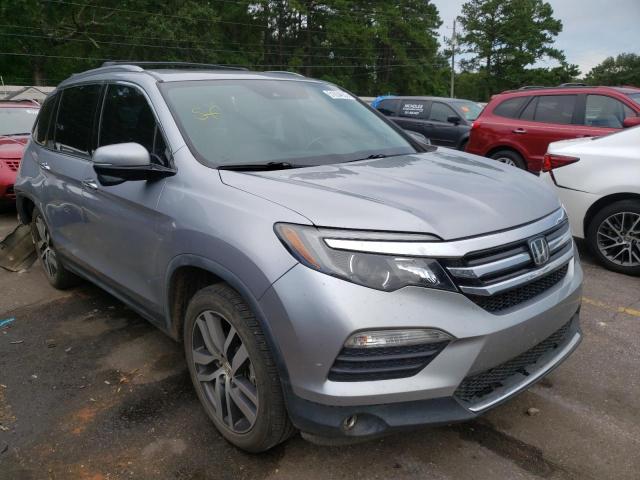 HONDA PILOT TOUR 2017 with VIN 5FNYF6H92HB035501 - Photo from auction