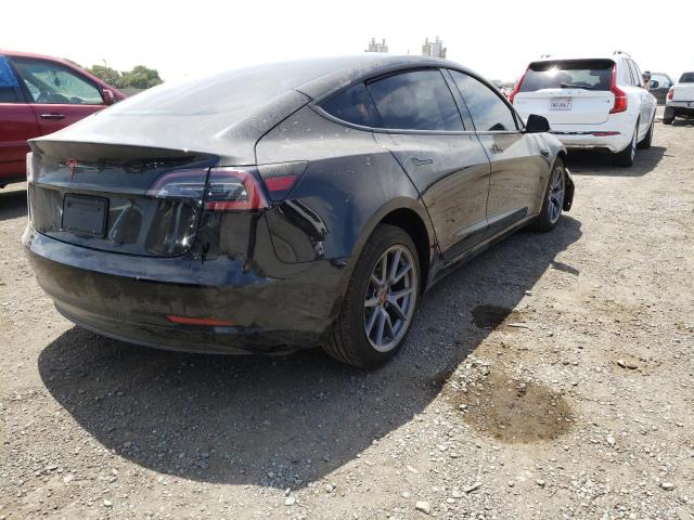 Photo 4 from auction – 2021 TESLA MODEL 3 with VIN 5YJ3E1EA5MF053368