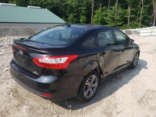 Foto 4 de la subasta – 2014 FORD FOCUS SE con VIN 1FADP3F25EL233651