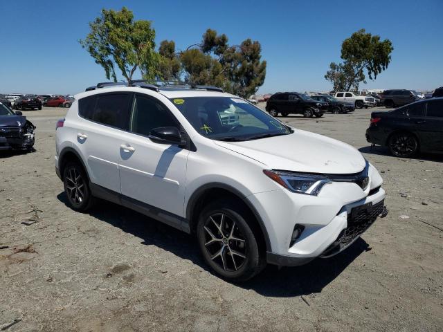 TOYOTA RAV4 SE 2018 with VIN JTMJFREV0JJ237174 - Photo from auction