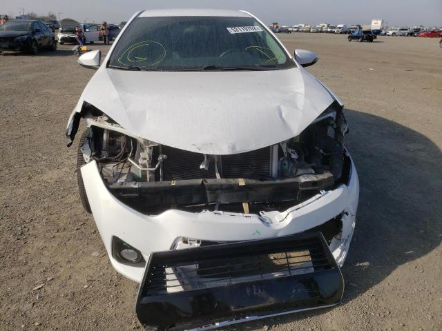 Photo 9 from auction – 2015 TOYOTA COROLLA L with VIN 5YFBURHE2FP230929