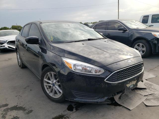 FORD FOCUS SE 2018 with VIN 1FADP3F20JL277339 - Photo from auction