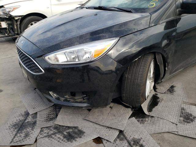 Photo 9 from auction – 2018 FORD FOCUS SE with VIN 1FADP3F20JL277339