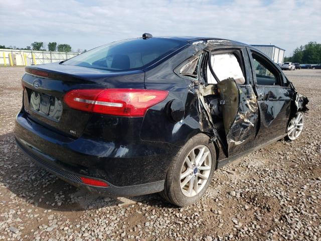Photo 4 from auction – 2016 FORD FOCUS SE with VIN 1FADP3F24GL316295