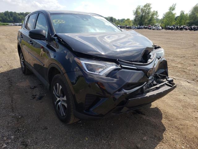 TOYOTA RAV4 LE 2018 with VIN 2T3BFREV4JW785409 - Photo from auction