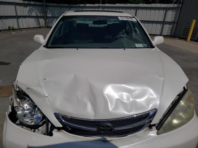 Photo 7 from auction – 2004 TOYOTA CAMRY LE with VIN JTDBE32K640282371