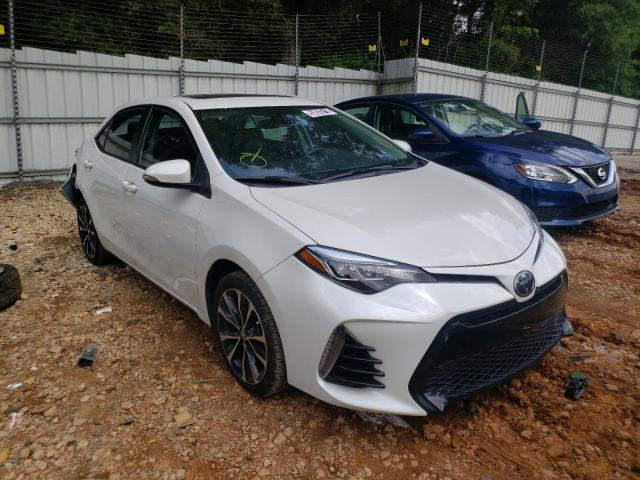 TOYOTA COROLLA L 2019 with VIN 5YFBURHE2KP869239 - Photo from auction