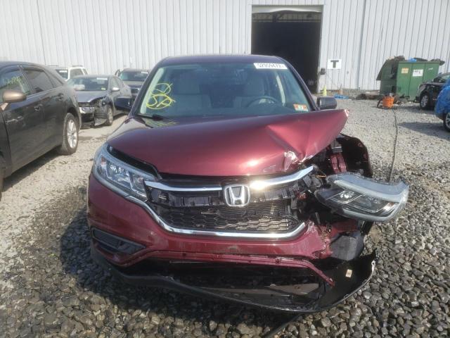 Photo 7 from auction – 2015 HONDA CR-V LX with VIN 2HKRM3H32FH528601