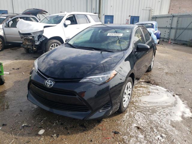 Photo 2 from auction – 2019 TOYOTA COROLLA L with VIN 5YFBURHE2KP949253