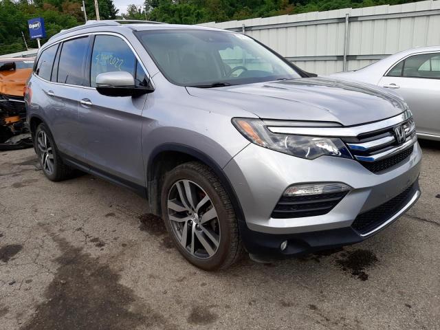 HONDA PILOT ELIT 2018 with VIN 5FNYF6H07JB026901 - Photo from auction