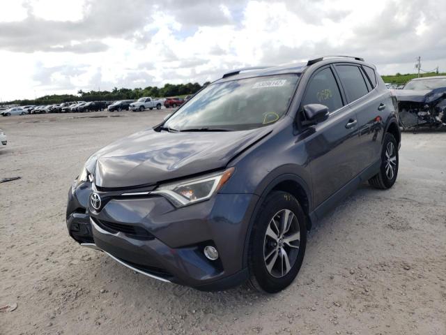 Photo 2 from auction – 2016 TOYOTA RAV4 XLE with VIN JTMWFREV6GJ092074