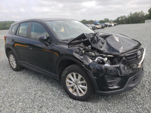 MAZDA CX-5 SPORT 2016 with VIN JM3KE2BE3G0671369 - Photo from auction