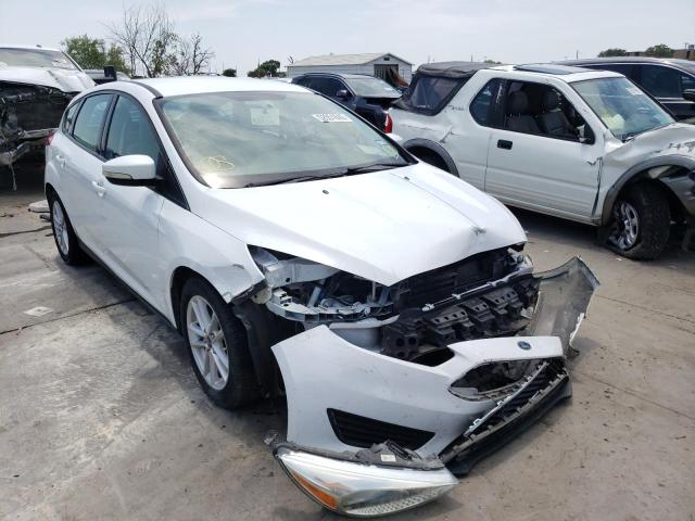 FORD FOCUS SE 2017 with VIN 1FADP3K2XHL276831 - Photo from auction