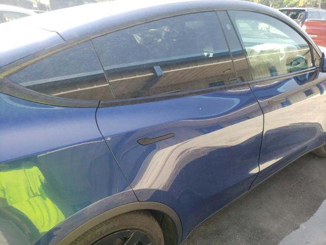 Photo 9 from auction – 2022 TESLA MODEL Y with VIN 7SAYGDEE5NF329573
