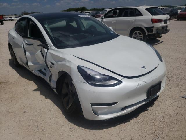 TESLA MODEL 3 2022 with VIN 5YJ3E1EB7NF130218 - Photo from auction