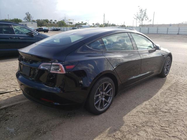 Photo 4 from auction – 2022 TESLA MODEL 3 with VIN 5YJ3E1EA1NF188848