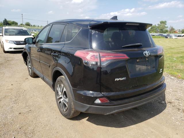 Photo 3 from auction – 2018 TOYOTA RAV4 LE with VIN 2T3BFREV4JW785409