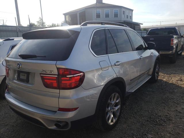 Photo 4 from auction – 2013 BMW X5 with VIN 5UXZV4C58D0E04310