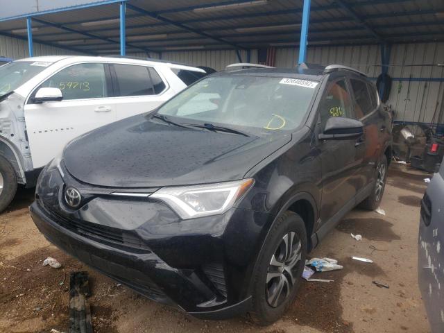 Photo 2 from auction – 2018 TOYOTA RAV4 LE with VIN 2T3BFREVXJW743312