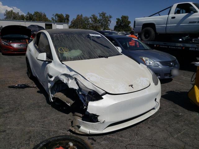 TESLA MODEL Y 2022 with VIN 7SAYGDEF6NF438245 - Photo from auction