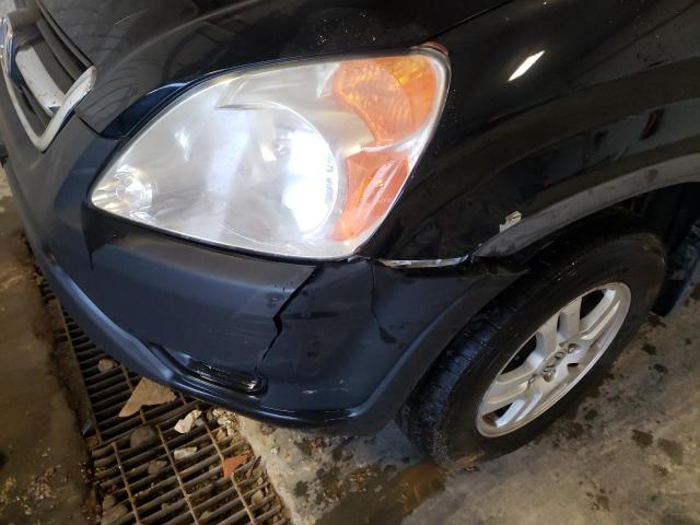 Photo 9 from auction – 2002 HONDA CR-V LX with VIN JHLRD68462C009957