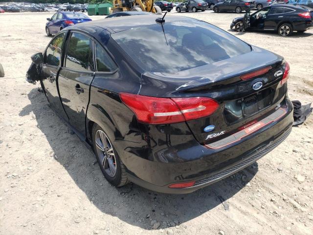 Photo 3 from auction – 2018 FORD FOCUS SE with VIN 1FADP3FE7JL210618