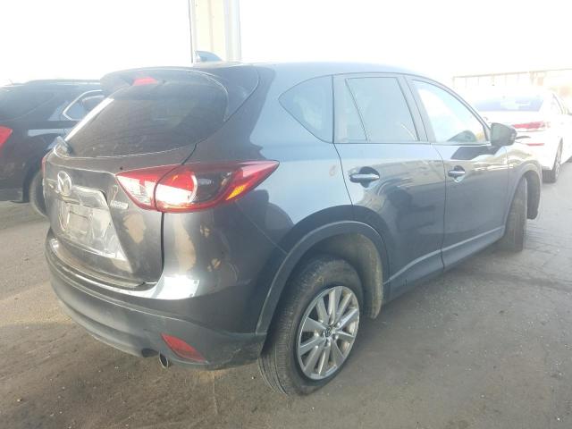 Photo 4 from auction – 2014 MAZDA CX-5 TOURI with VIN JM3KE2CY3E0423399