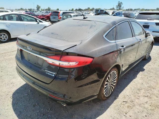 Photo 4 from auction – 2017 FORD FUSION TIT with VIN 3FA6P0RU9HR264847