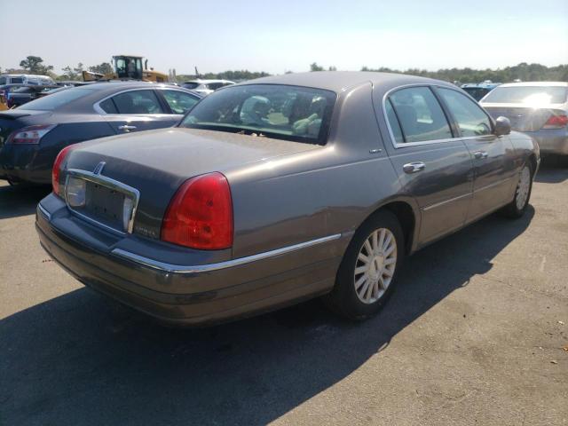 Photo 4 from auction – 2003 LINCOLN TOWN CAR with VIN 1LNHM81W63Y636030
