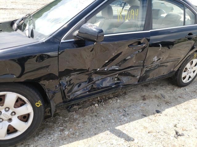Photo 9 from auction – 2007 KIA OPTIMA LX with VIN KNAGE123475156906